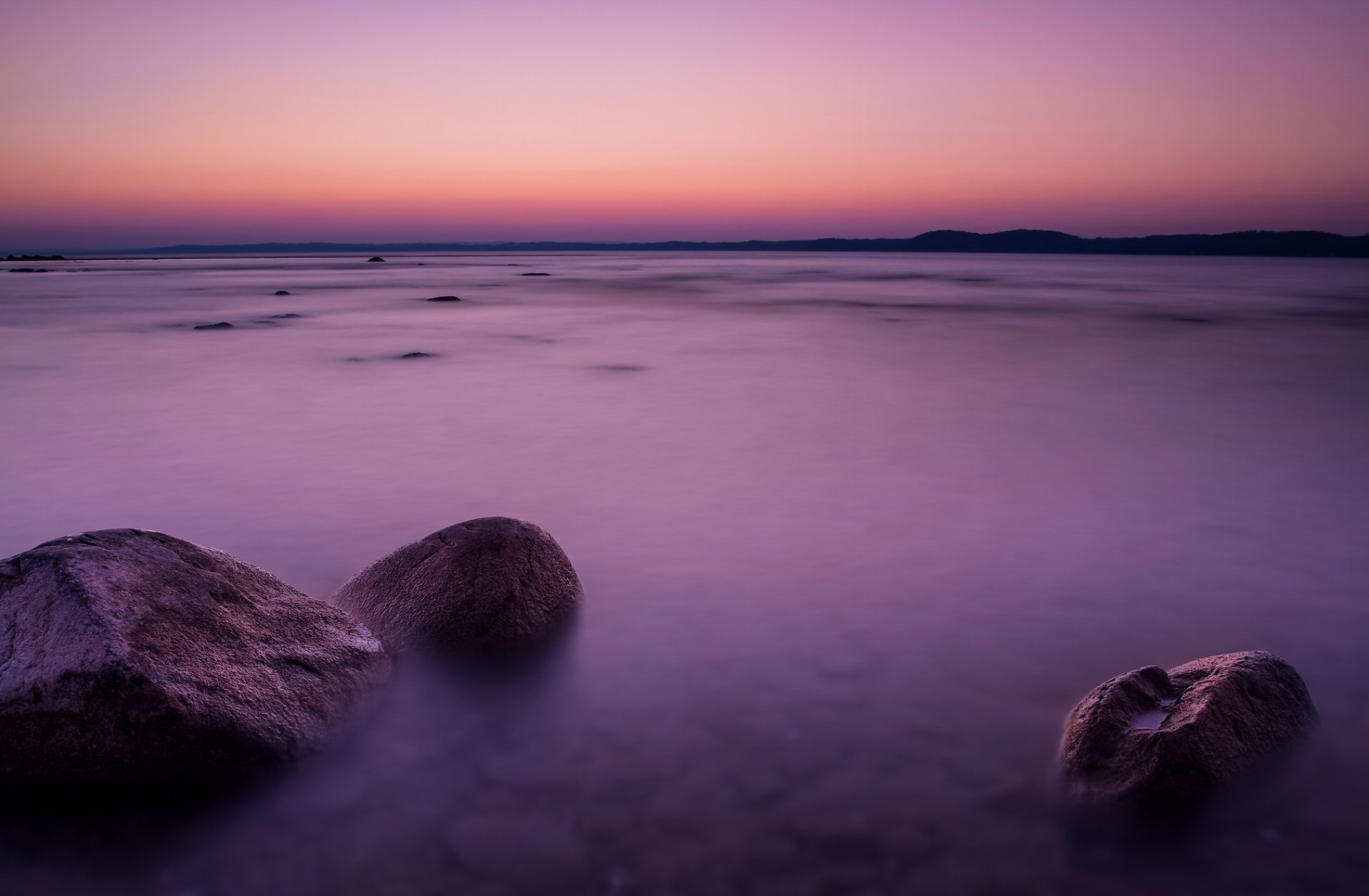 lago michigan riva rocce sera tramonto arancione cremisi cielo