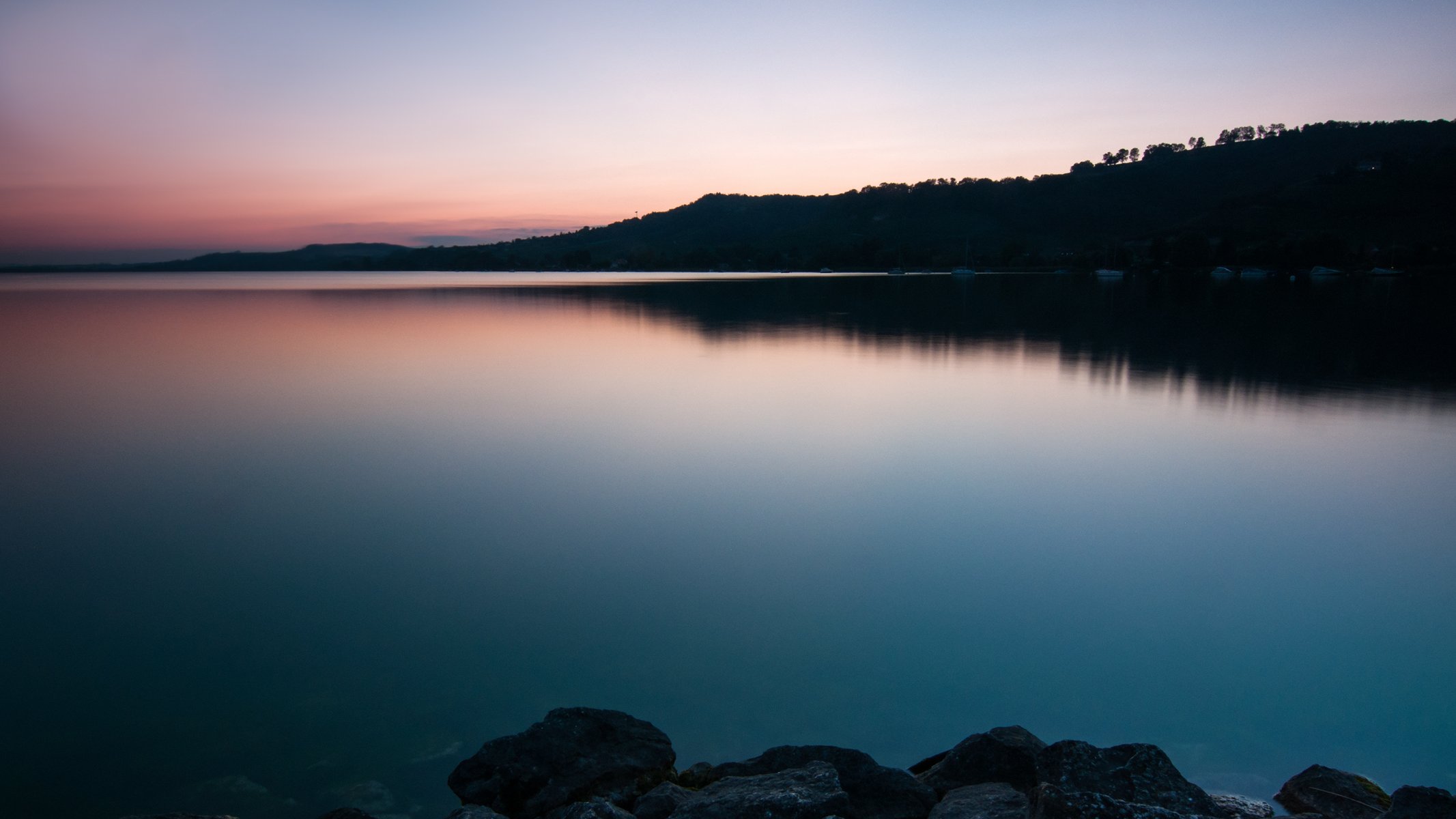 witzerland lake beach stones water surface of tree night sunset sky