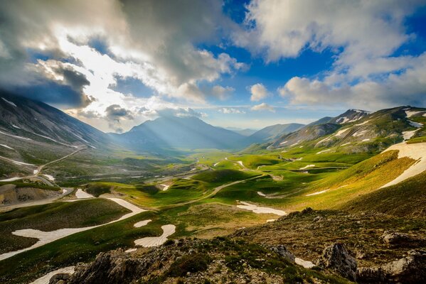 Italian mountains under the rays of the sun