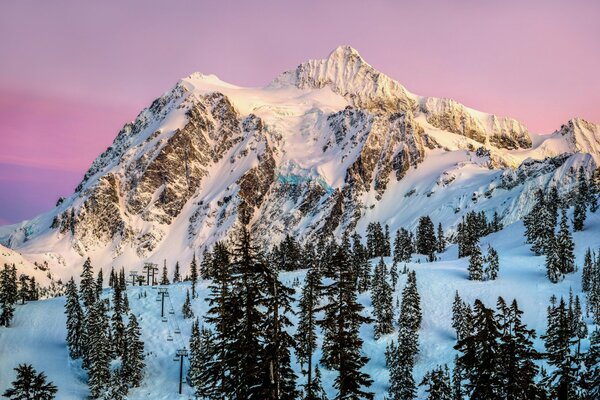 A mountain peak covered with snow