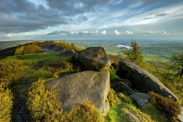 Rocks in the valley overgrown with moss