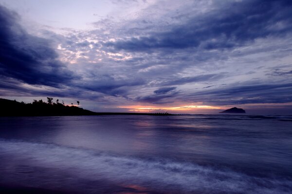 Blue seascape at sunset