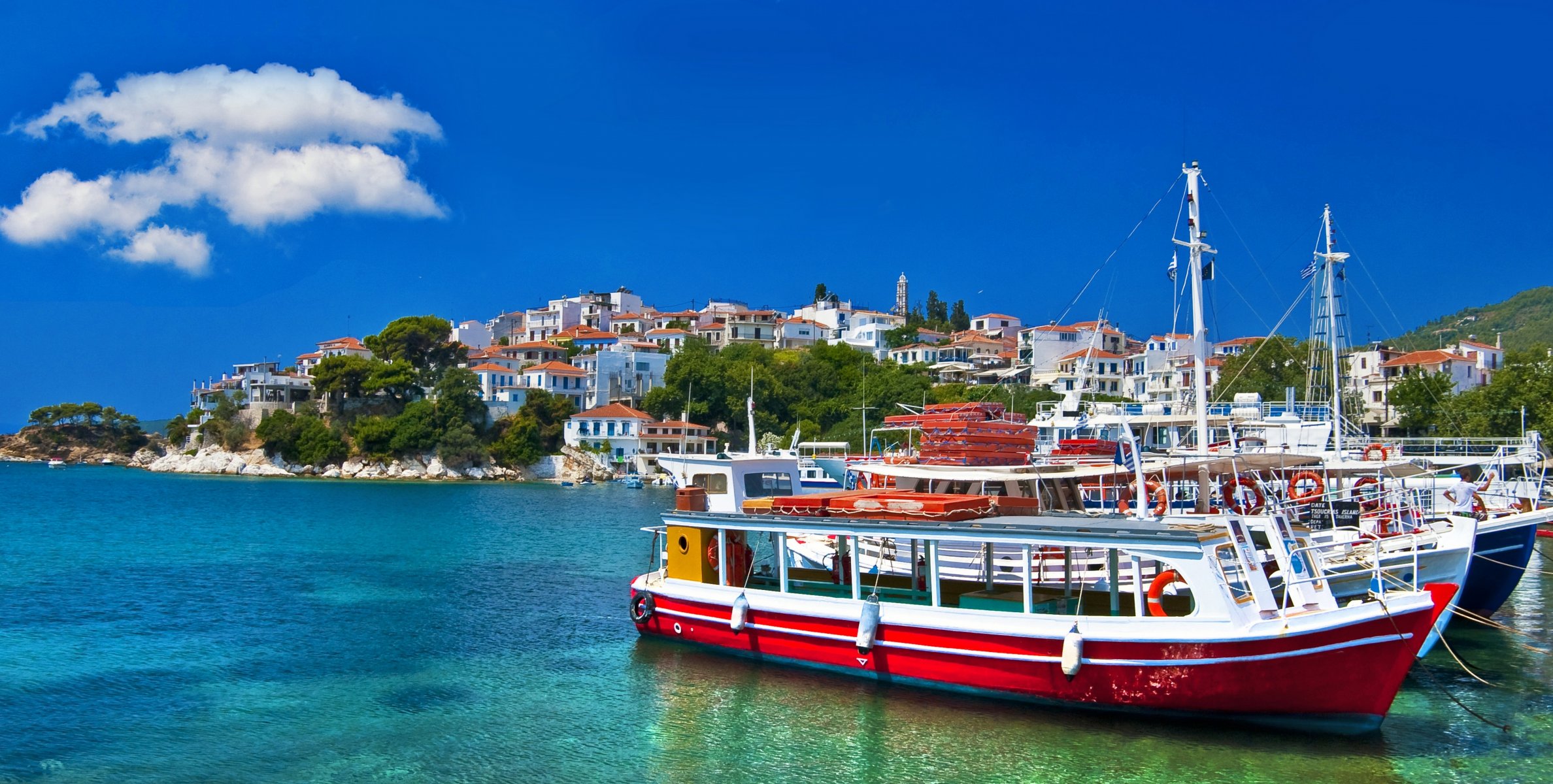 grèce mer bateaux nature ciel nuages maisons