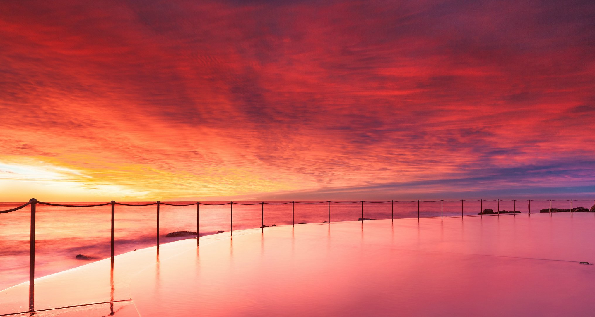 australia oceano spiaggia piscina spiaggia recinzione catene sera tramonto cielo nuvole