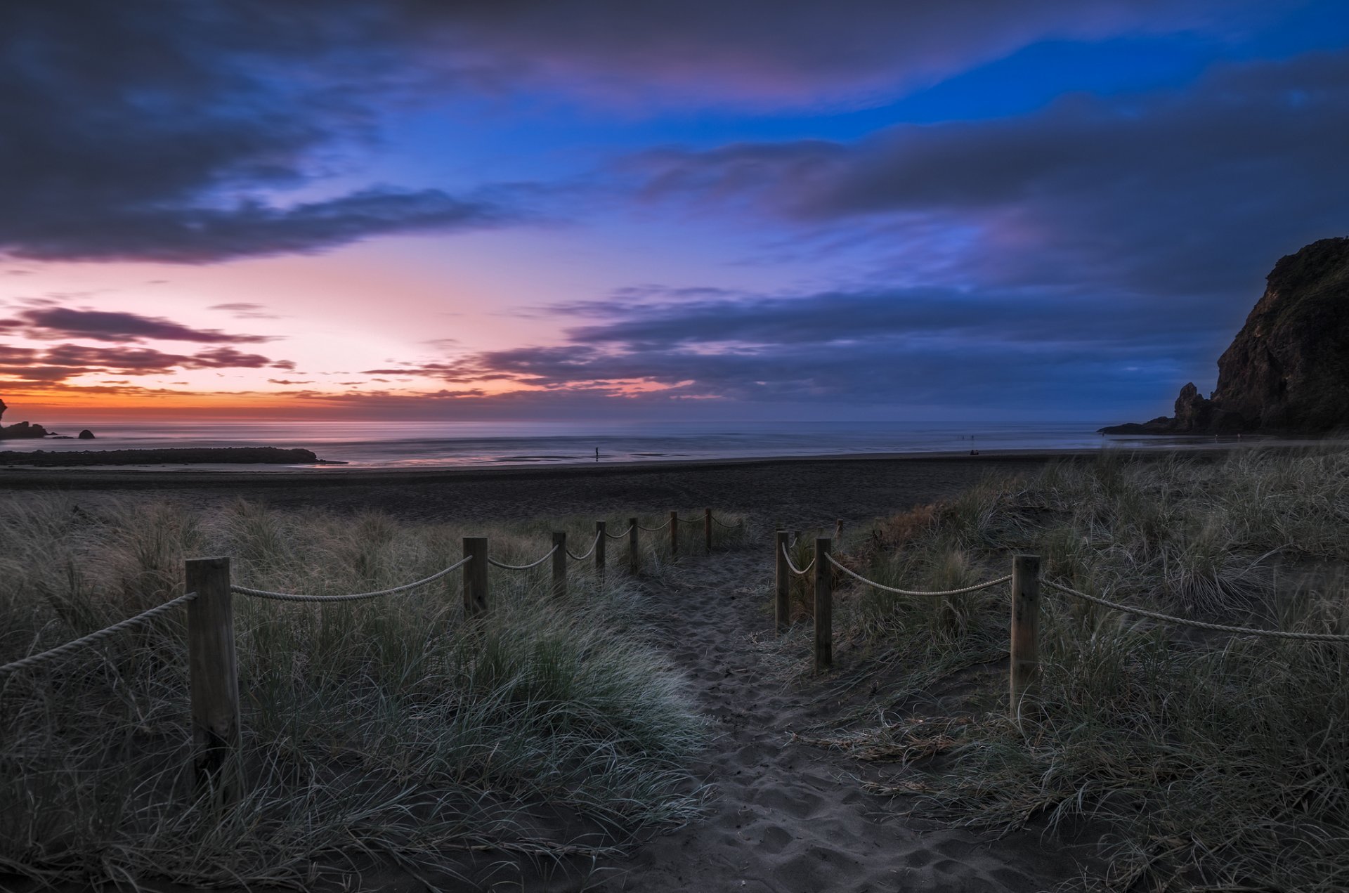 neuseeland strand gras sand küste meer rock abend dämmerung sonnenuntergang himmel wolken