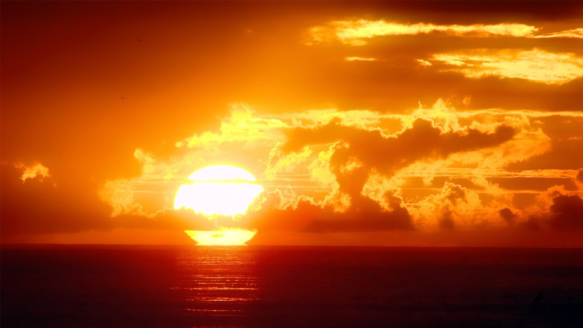 mar océano distancia horizonte cielo nubes sol amanecer puesta del sol