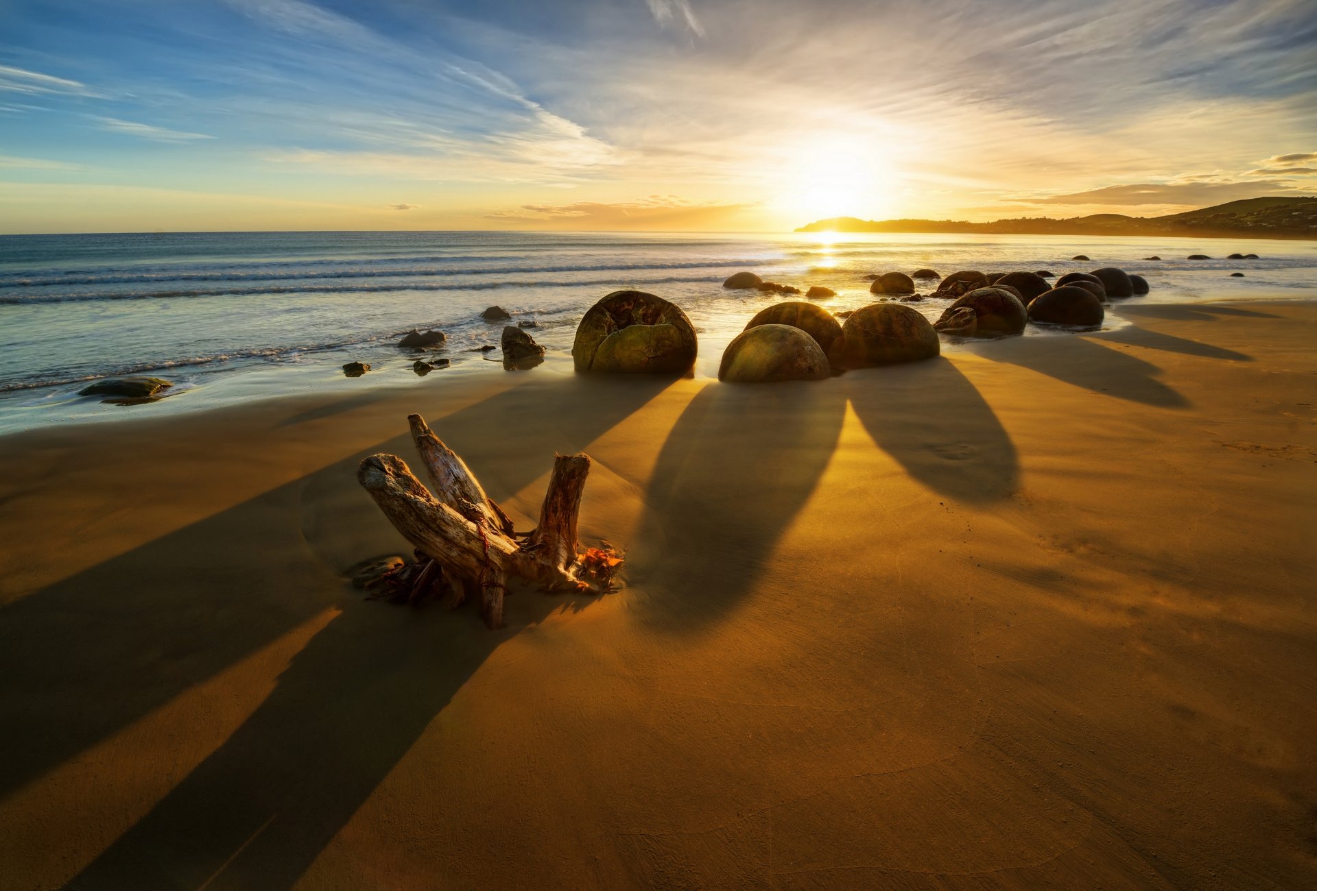 nueva zelanda océano amanecer piedras costa