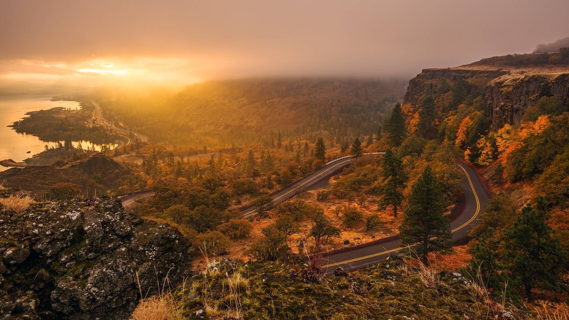 landscape road track tree sun sunset sky mountain water light