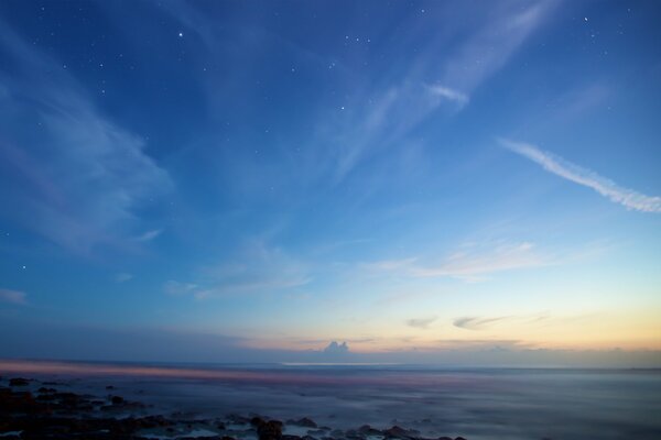 Clouds on the background of the sea