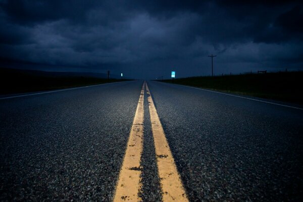 The road leads into the gloomy distance