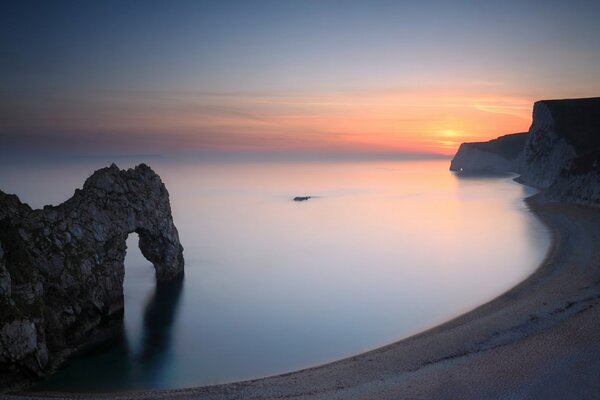 Rock in the form of an arch on the beach