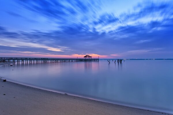 Beach with pier and bay in Virginia