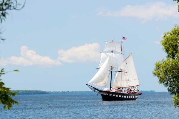 A ship on a light sky background