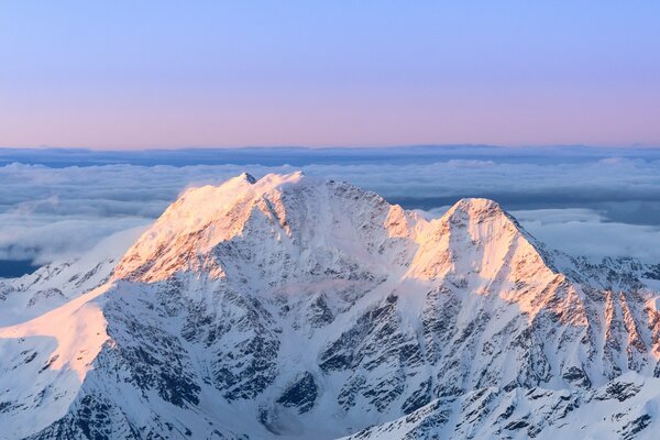 Mountain glacier in the dawn rays