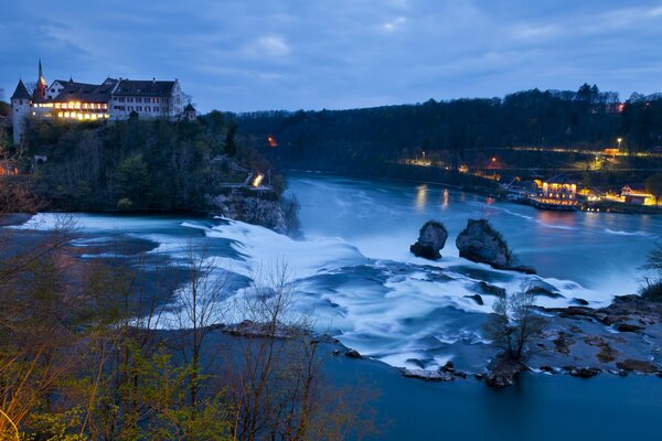 A river in Switzerland . Beautiful waterfall