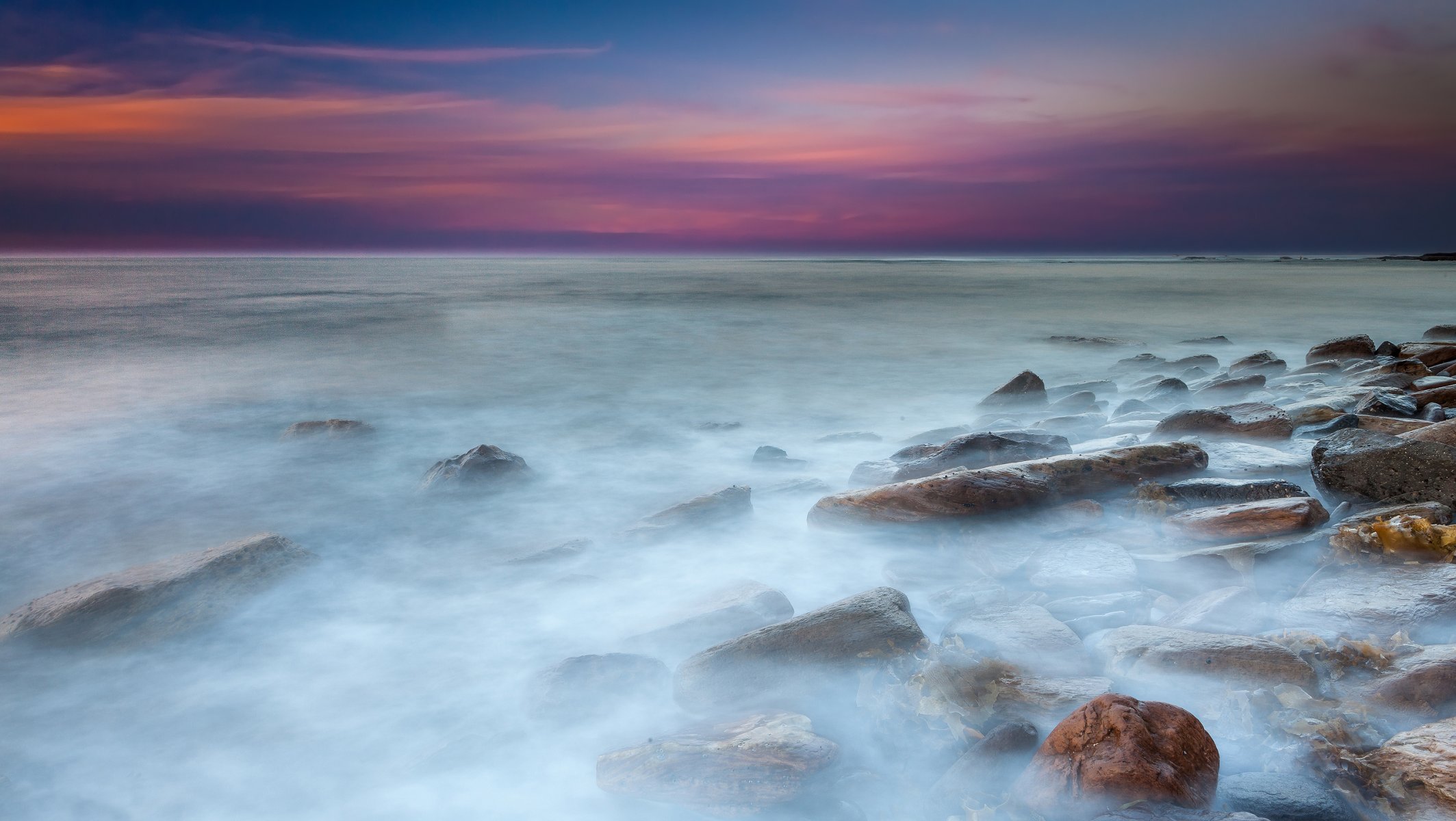 sonnenuntergang meer steine wasser belichtung