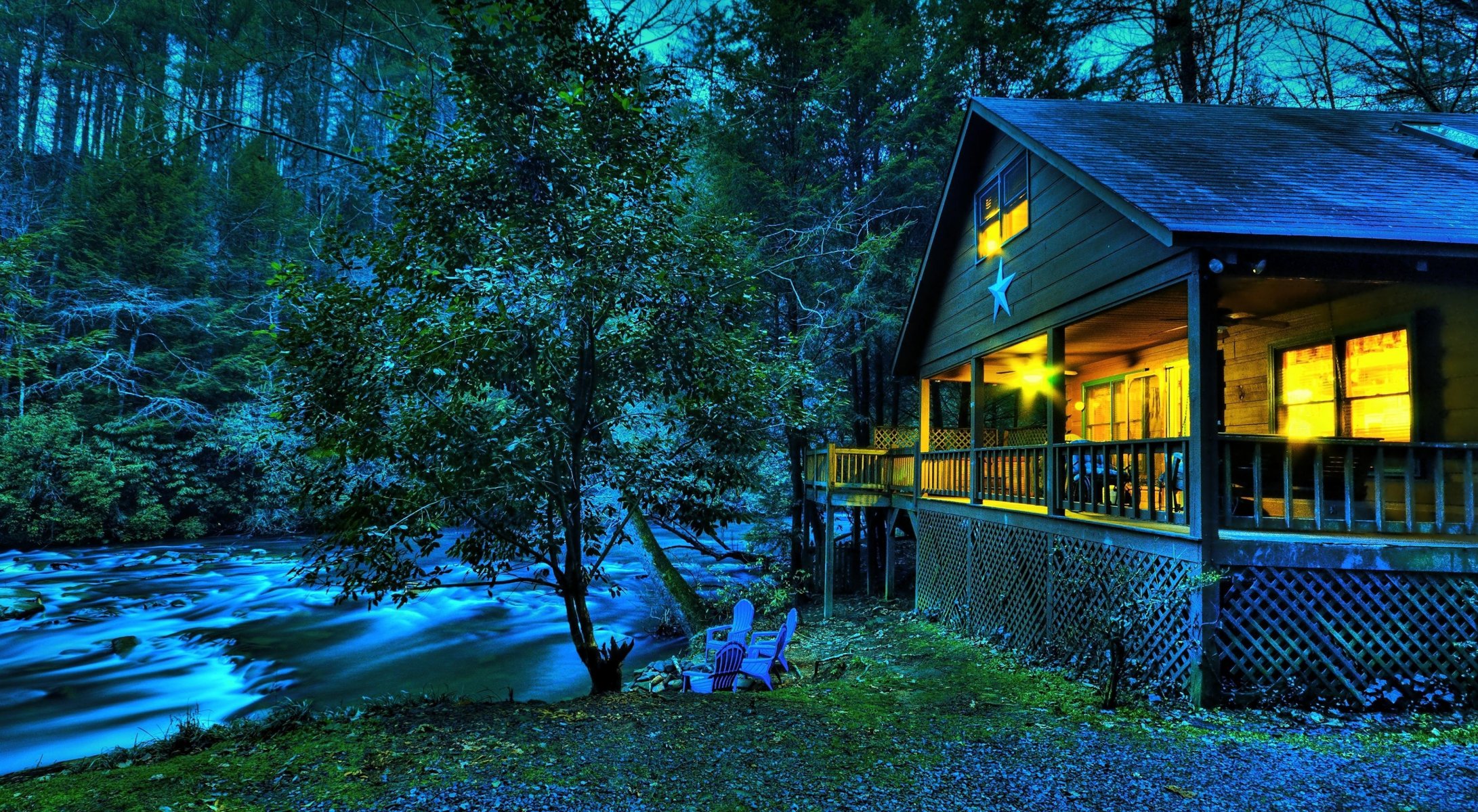 nature forest tree grass leaves night twilight house verandah light star chairs armchairs river creek water