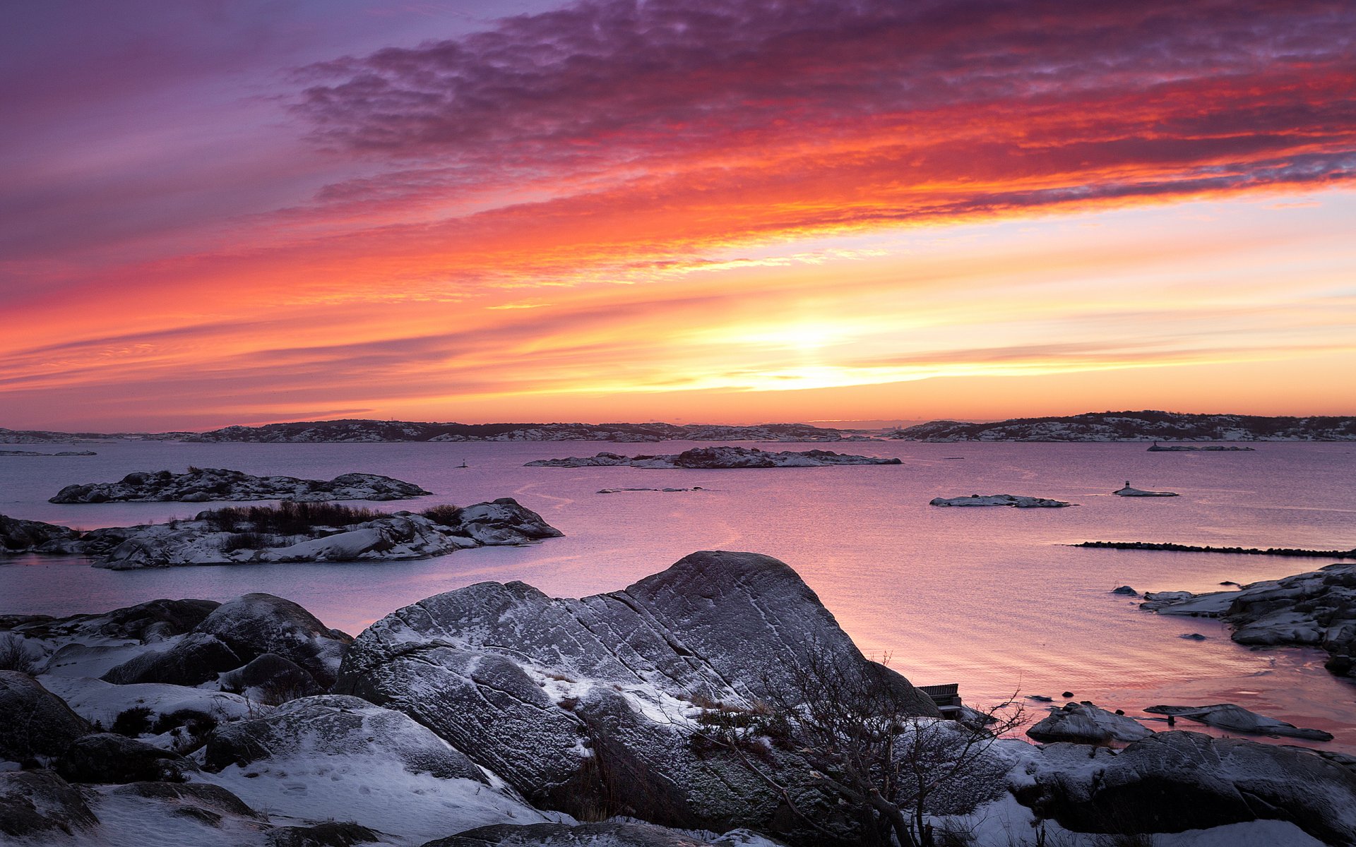 schweden abend sonnenuntergang himmel wolken steine ufer schnee meer