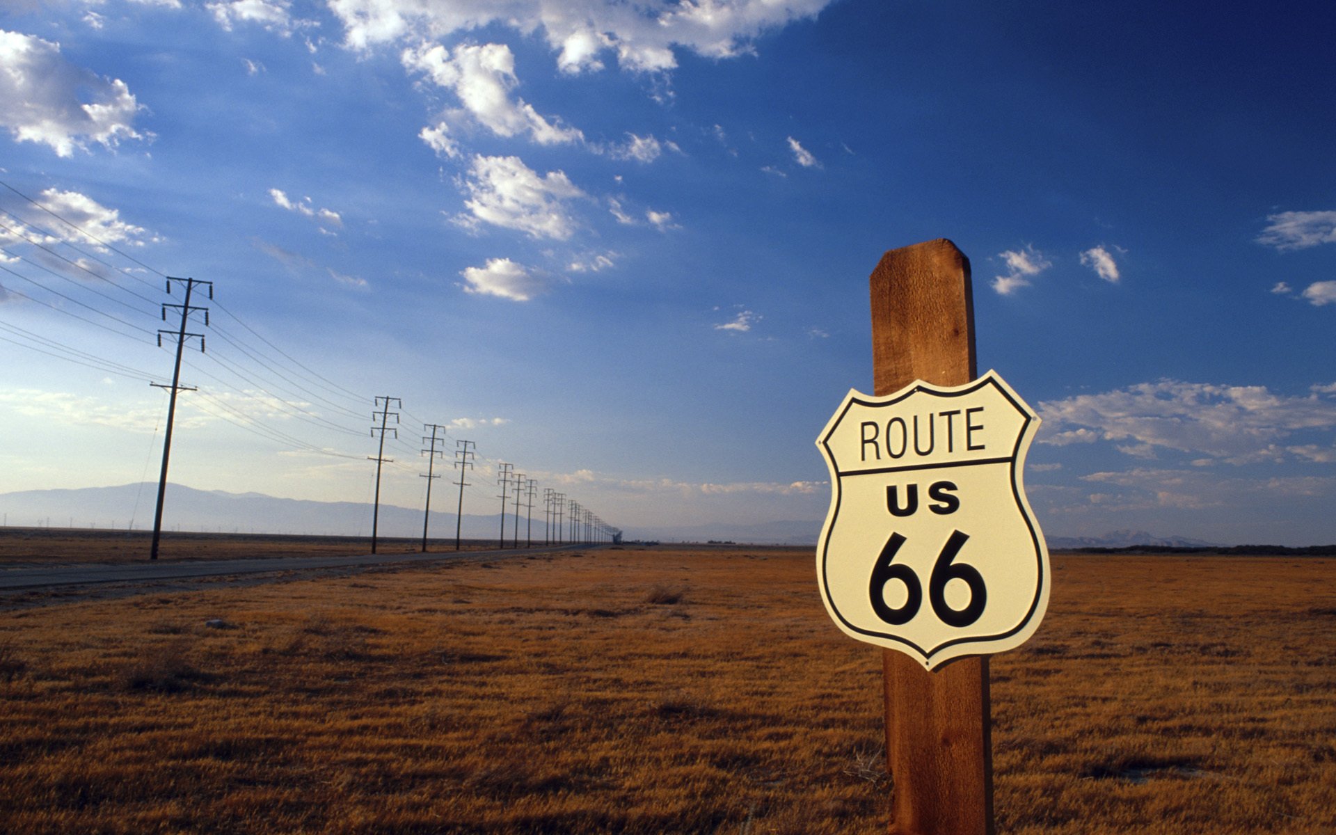 route 66 us road the field sky traffic sign mountain landscape