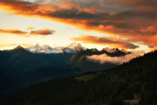 Sunset in the Alps. Clouds in the sky