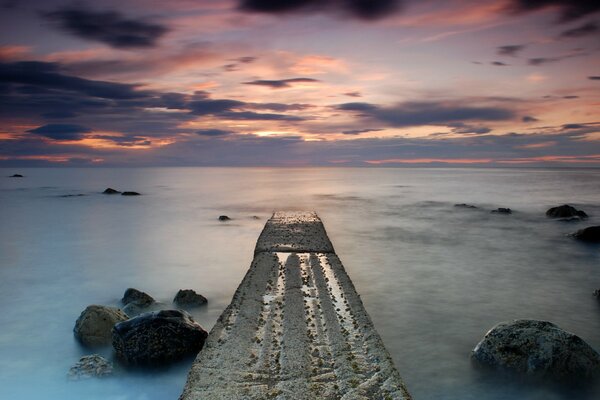 Calm at sea under the evening sky