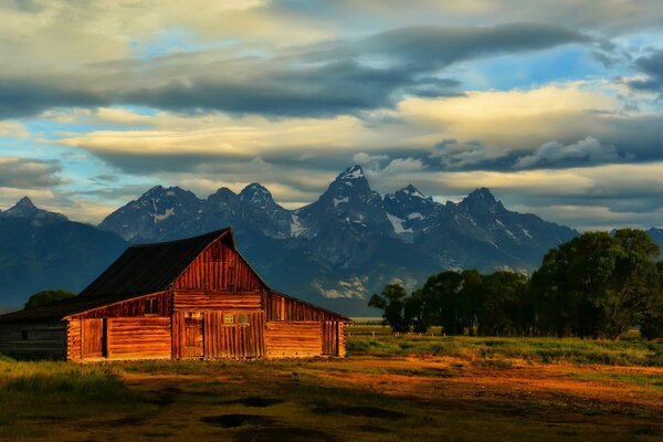 Wooden house at sunset