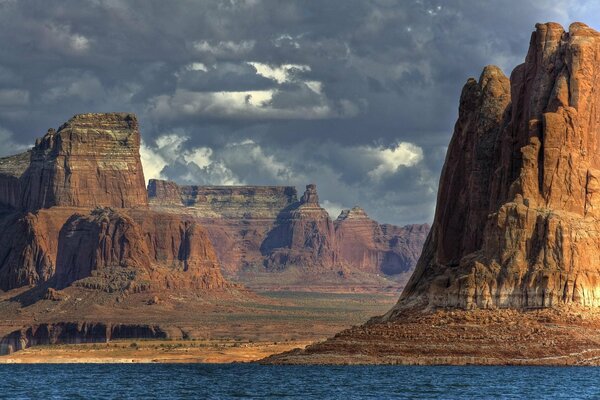 Exposed rocks under a harsh cloudy sky