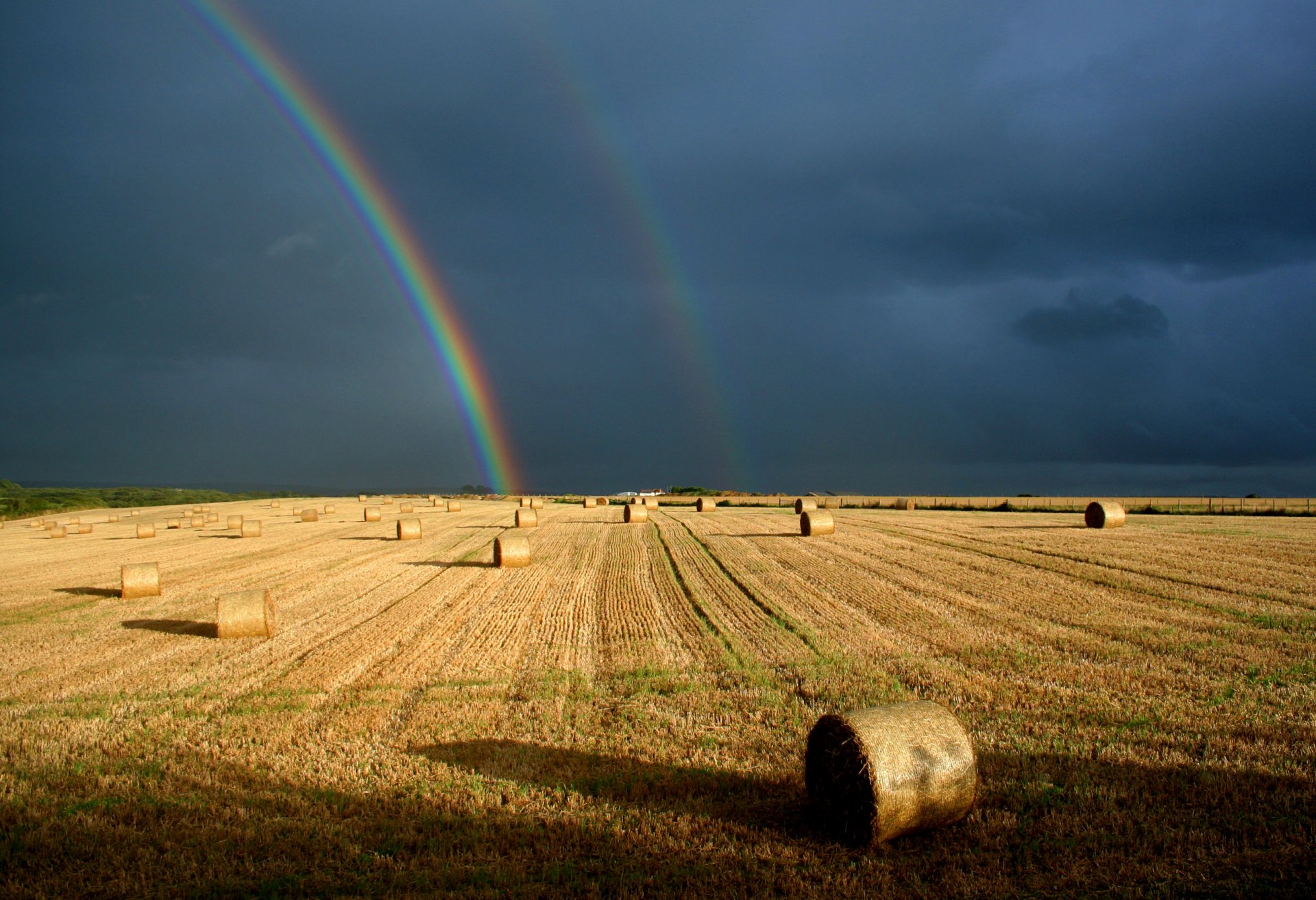 the field rolls sky rainbow contrast