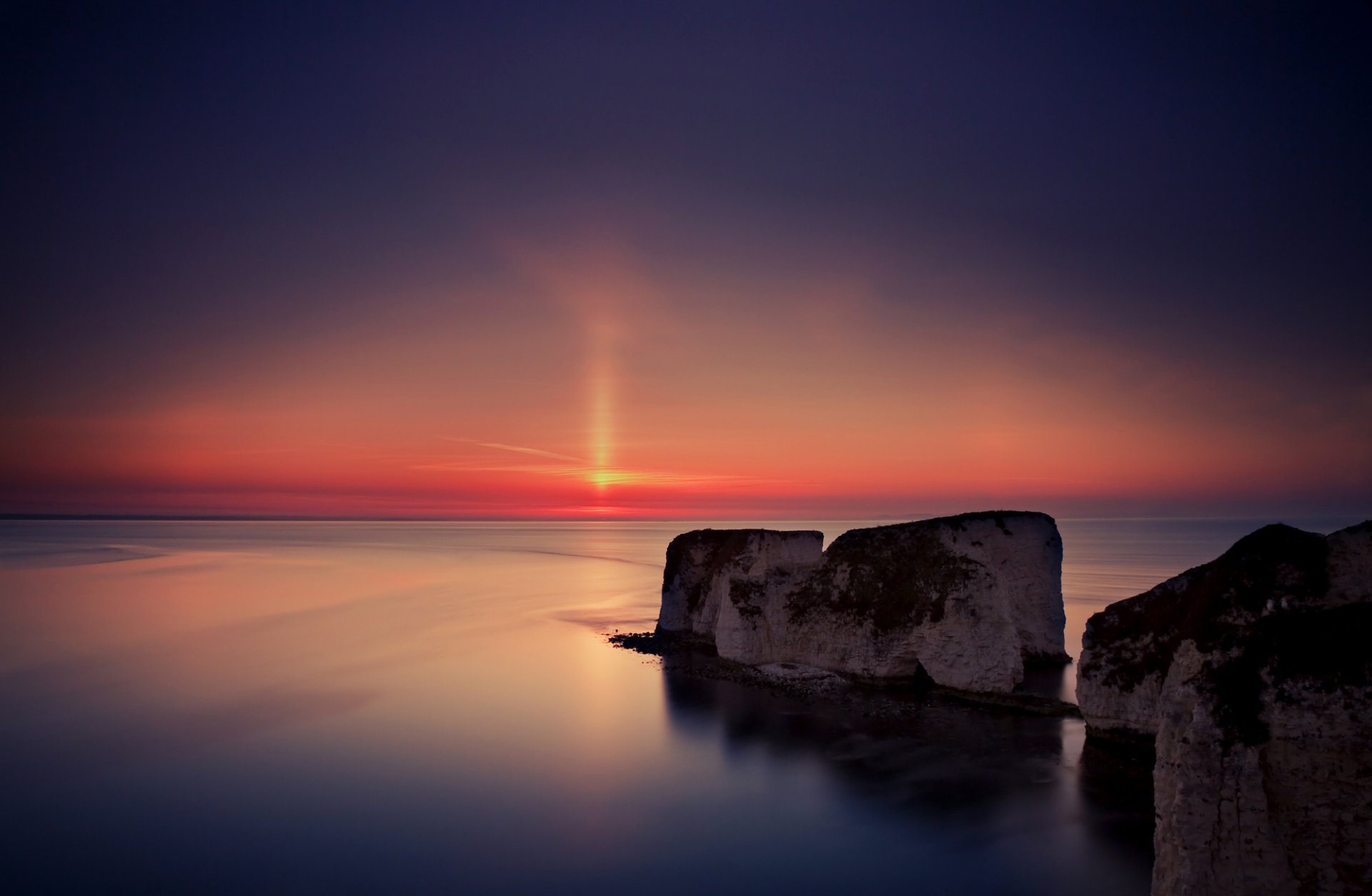 united kingdom england night sun sunset mountain beach sea water surface of calm