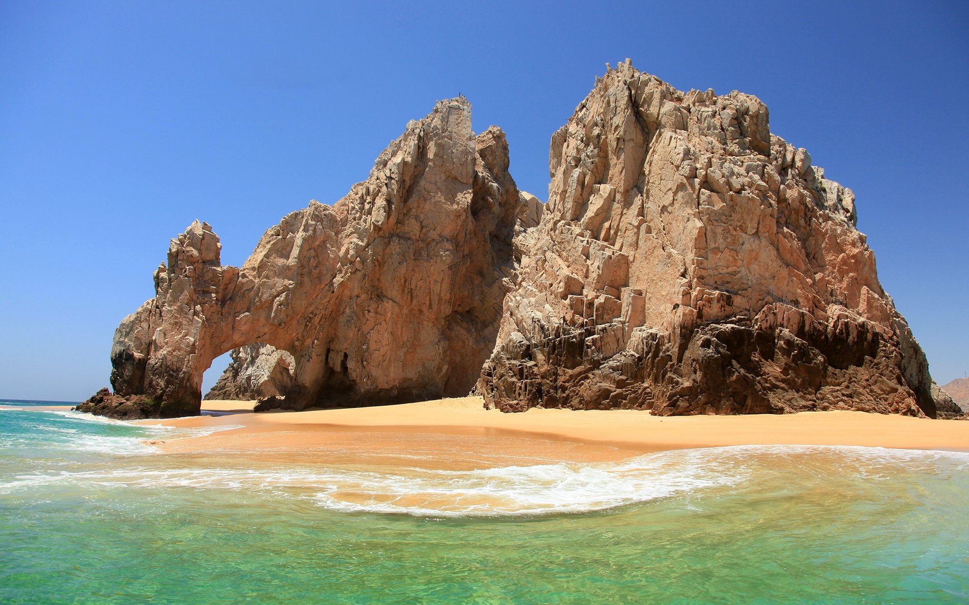 mare rocce arco paesaggio