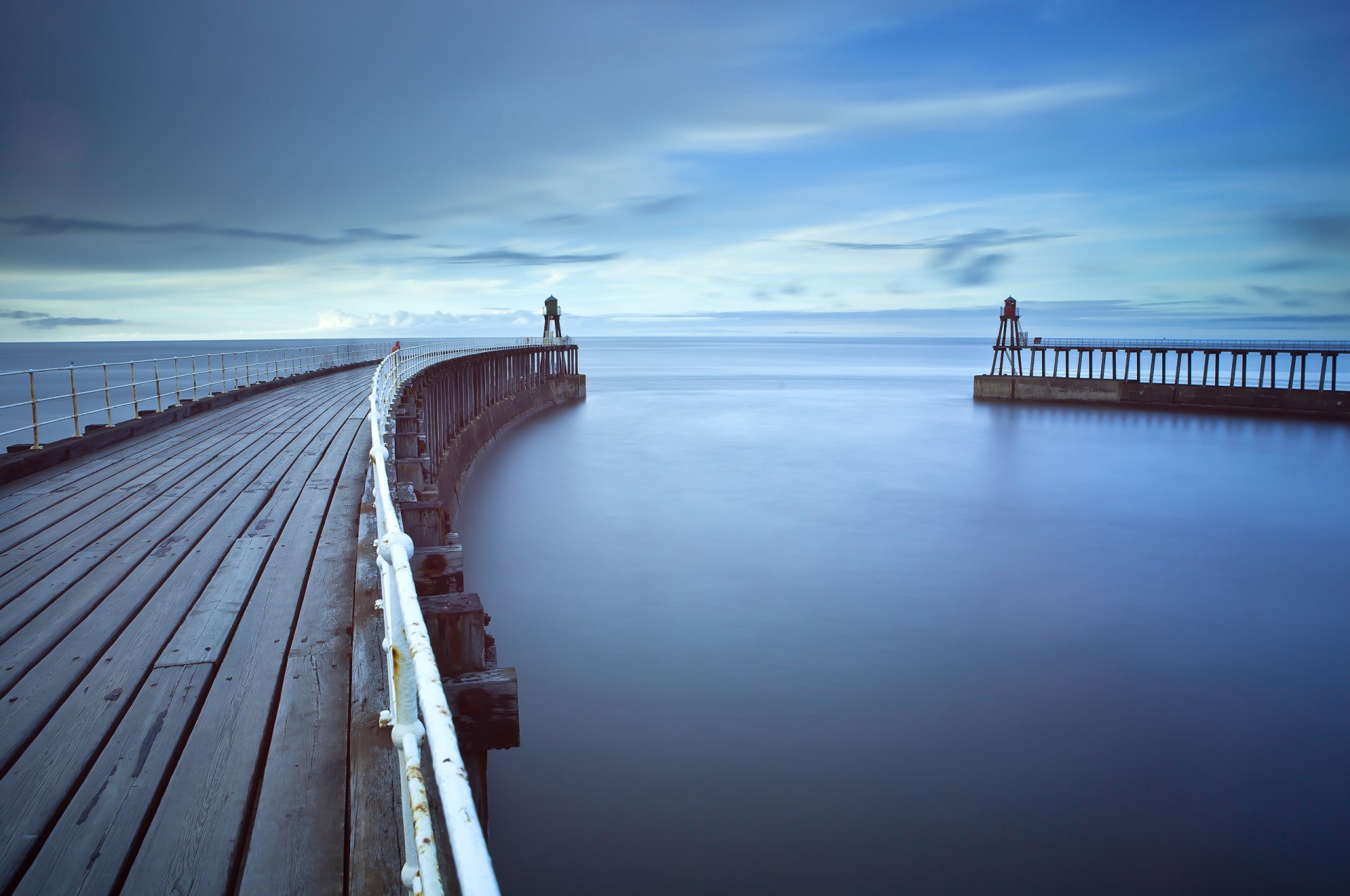 walking board pier sky sea surface of