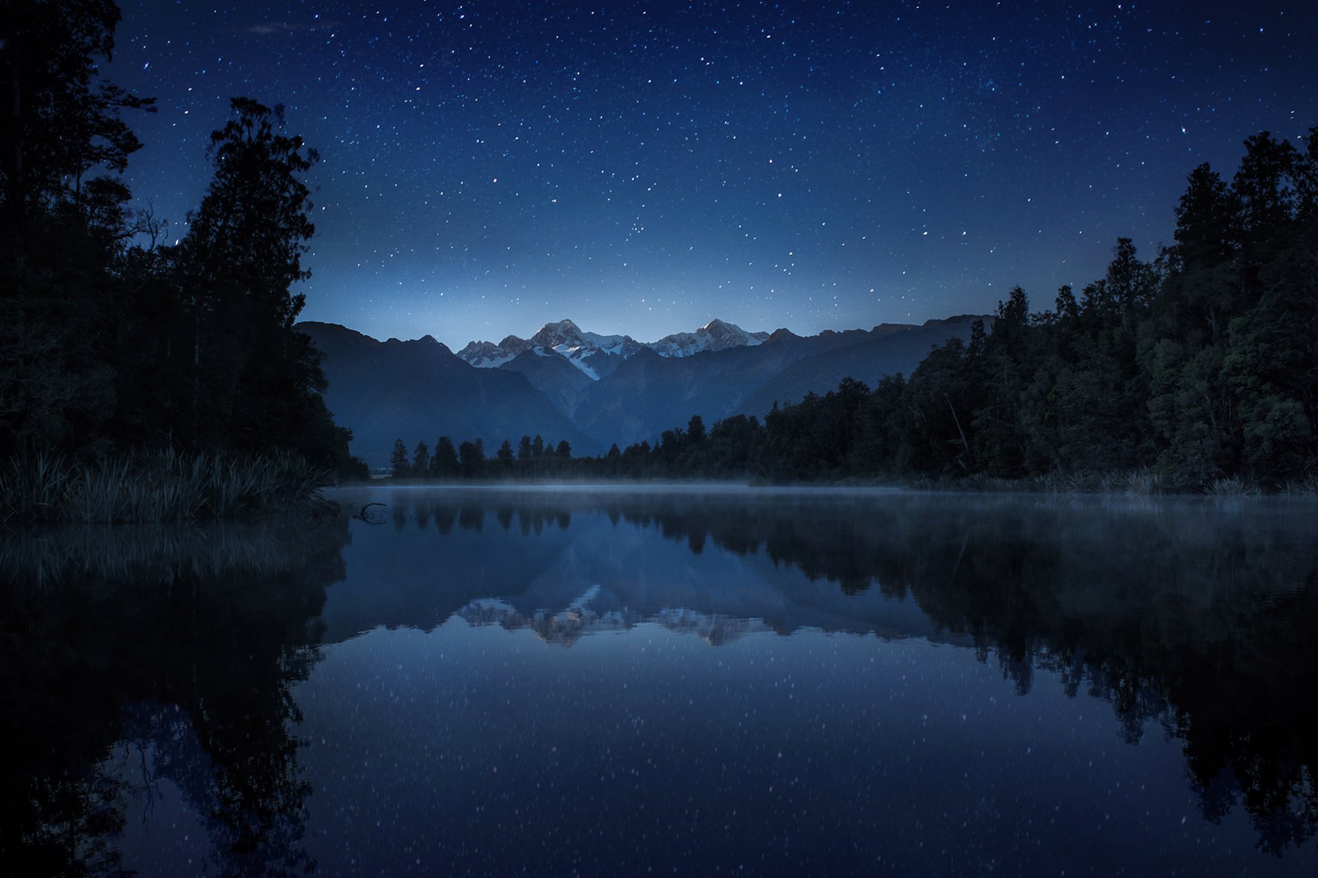 notte lago montagne cielo stelle riflessione foschia canne alberi nuova zelanda lago matheson