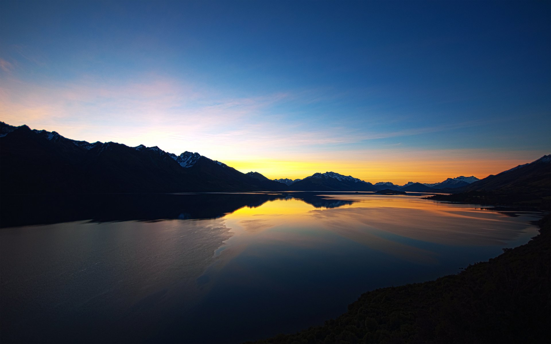 nueva zelanda montañas lago tarde puesta del sol cielo nubes