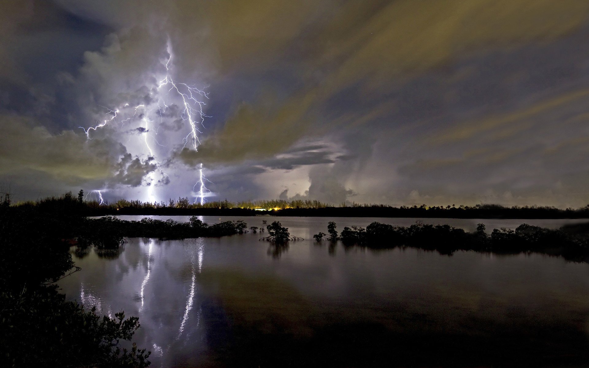 lake night distance horizon sky lightning discharge clouds clouds thunderstorm rain