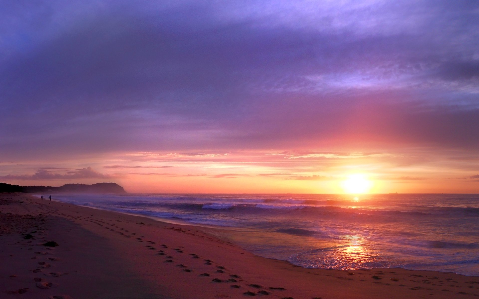 australia evening beach ocean sunset coast waves people away two walk sand traces night sun sky cloud