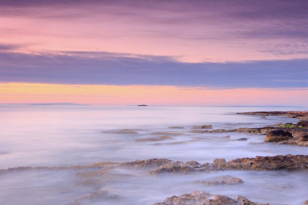 The ocean merges with the sky