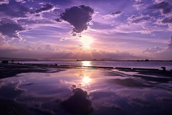 Lilac sunset on the background of the sea