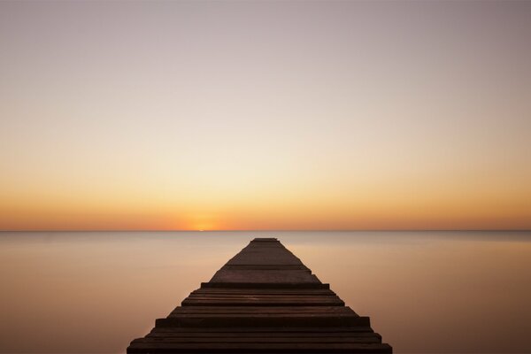 Wooden bridge during sunset