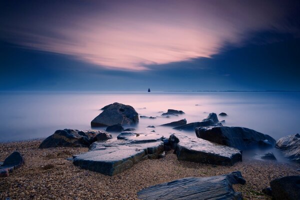 Stones on the seashore in the evening