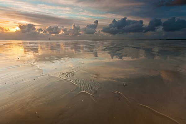 Sandy deserted beach with crystal water