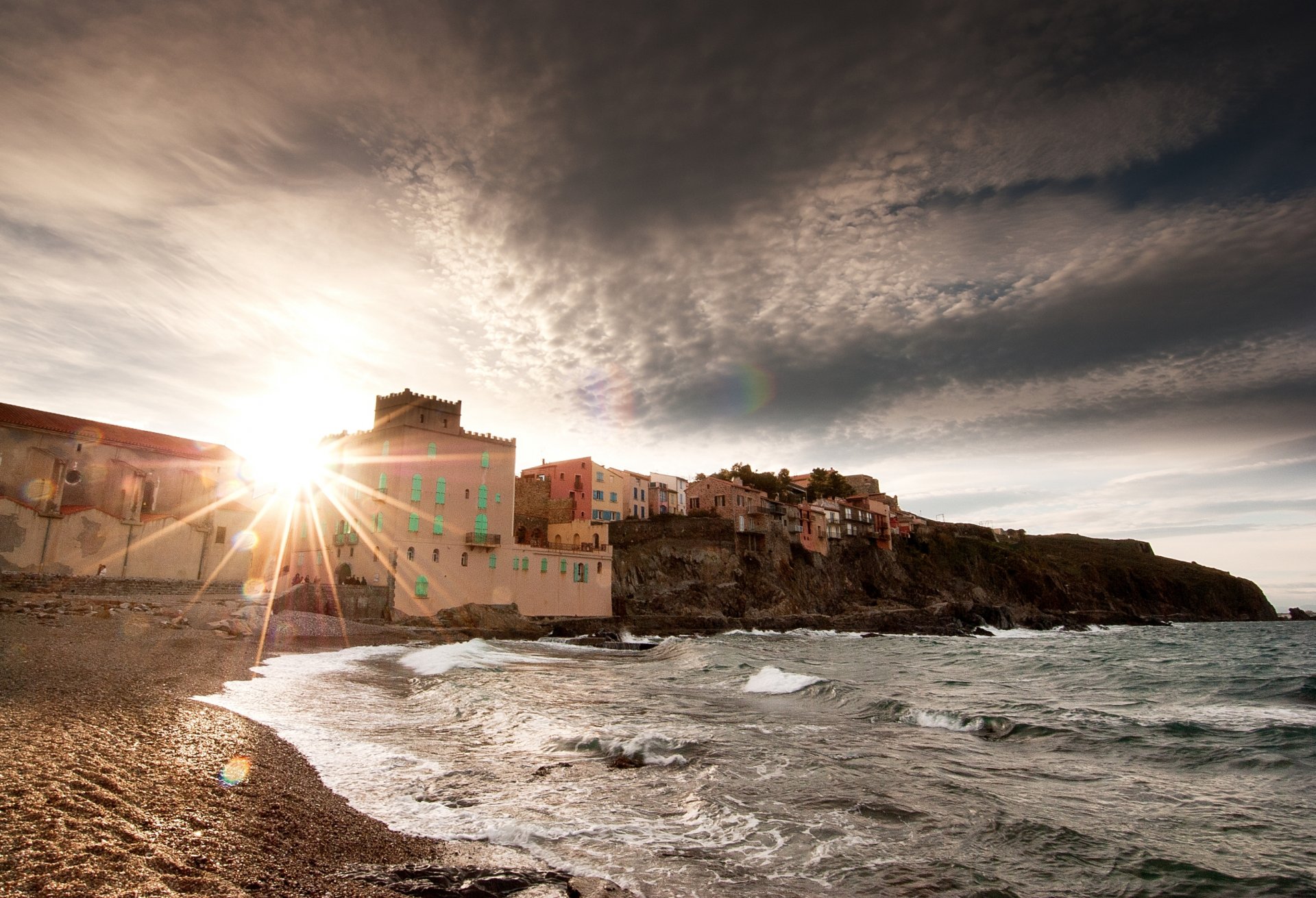 landscape shore beach sea waves sun sky rock house