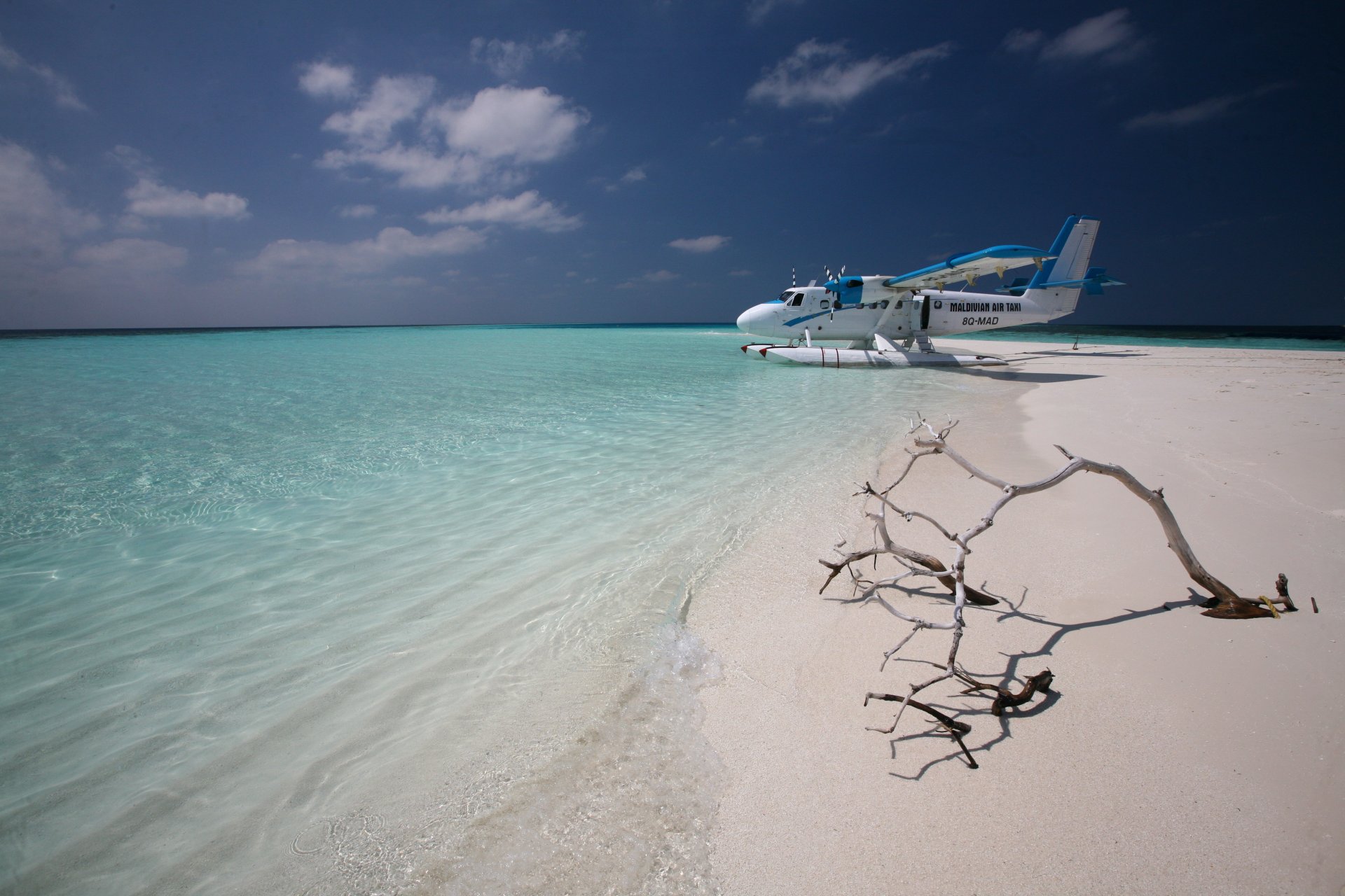 malediven taxi flugzeug ozean sand insel horizont