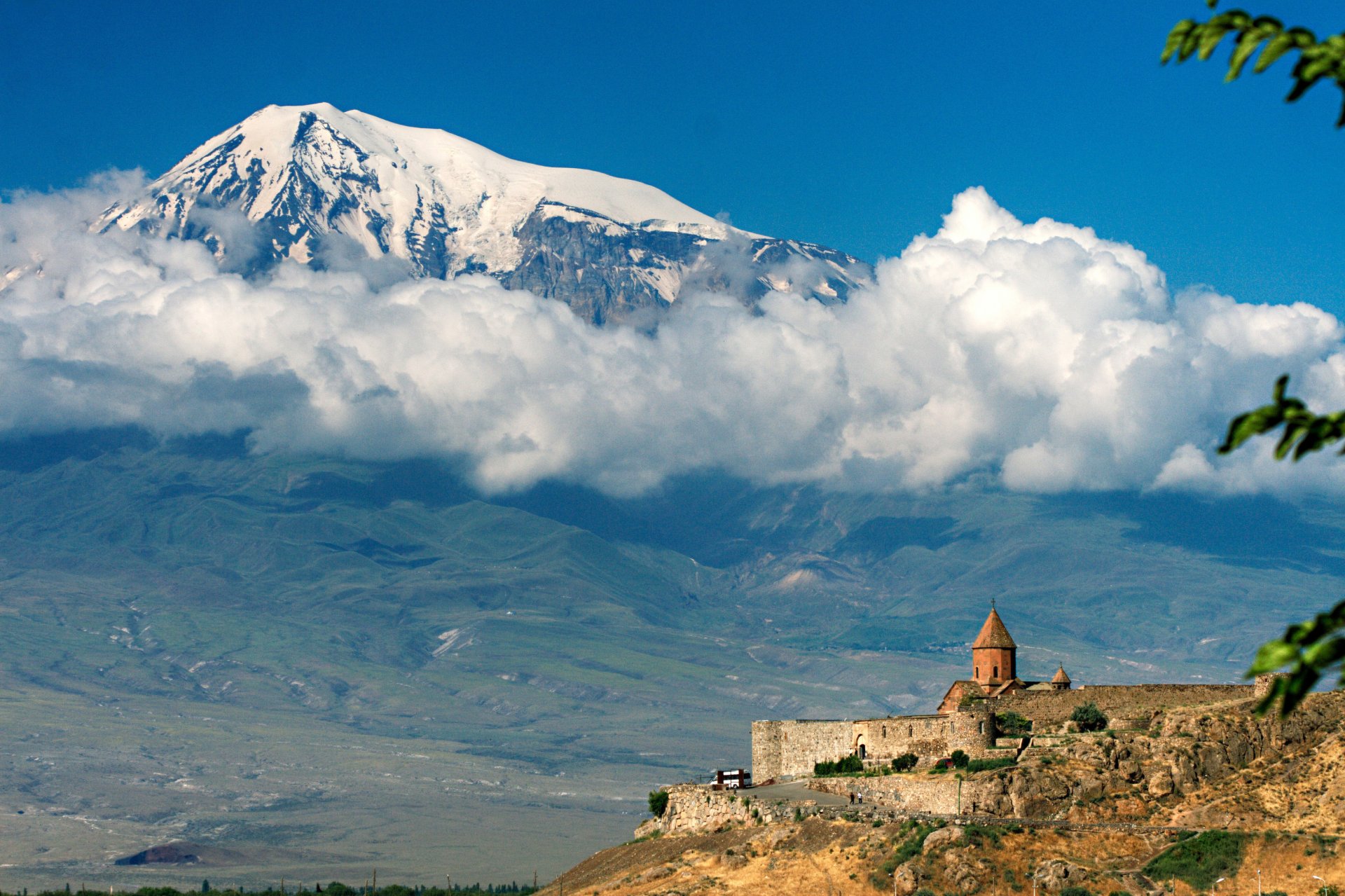 mountains slopes mountain peak peak snow valley castle hill clouds sky photo nature