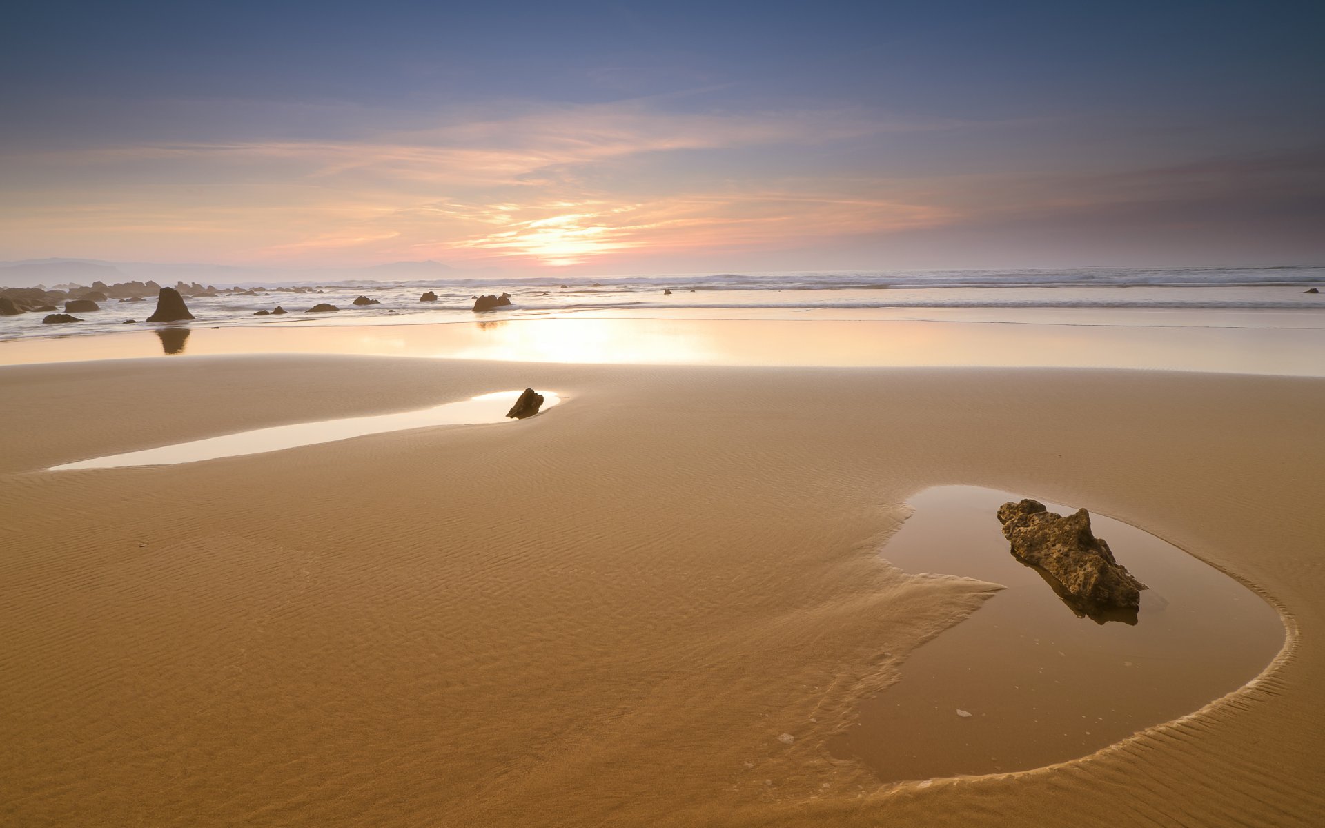 sonnenuntergang himmel küste sand steine meer