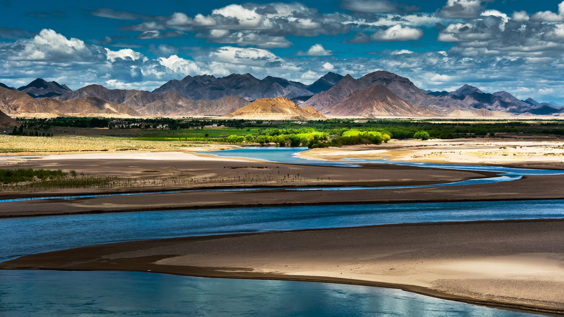 cina tibet oasi fiume montagna cielo nuvole ombra luce