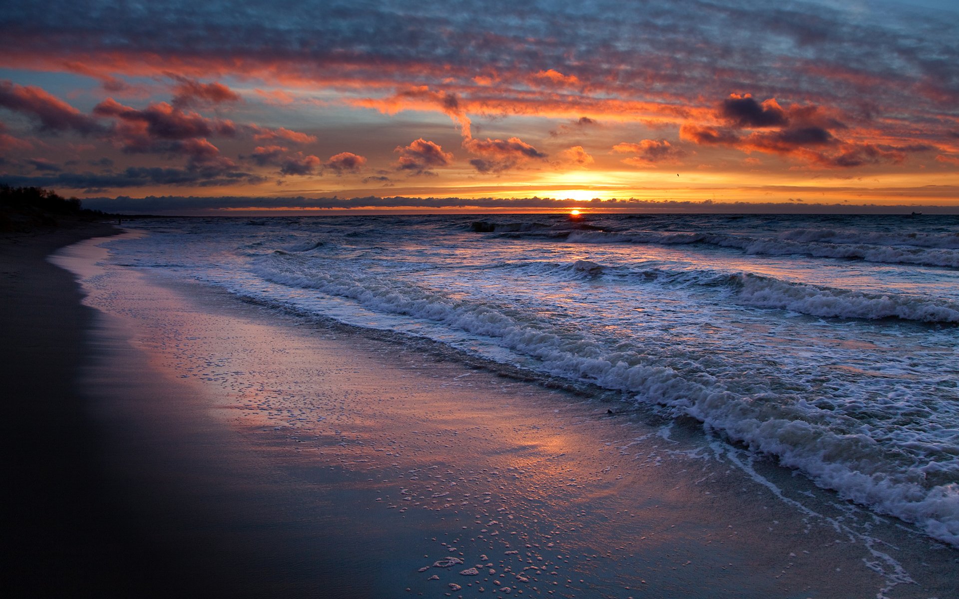 ea waves water shore sand beach sun sunset sky clouds landscape