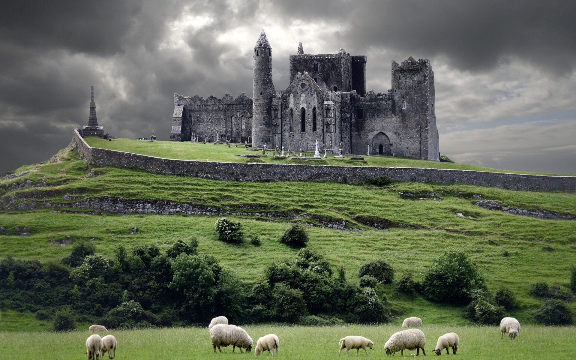 irlande château nuages colline moutons