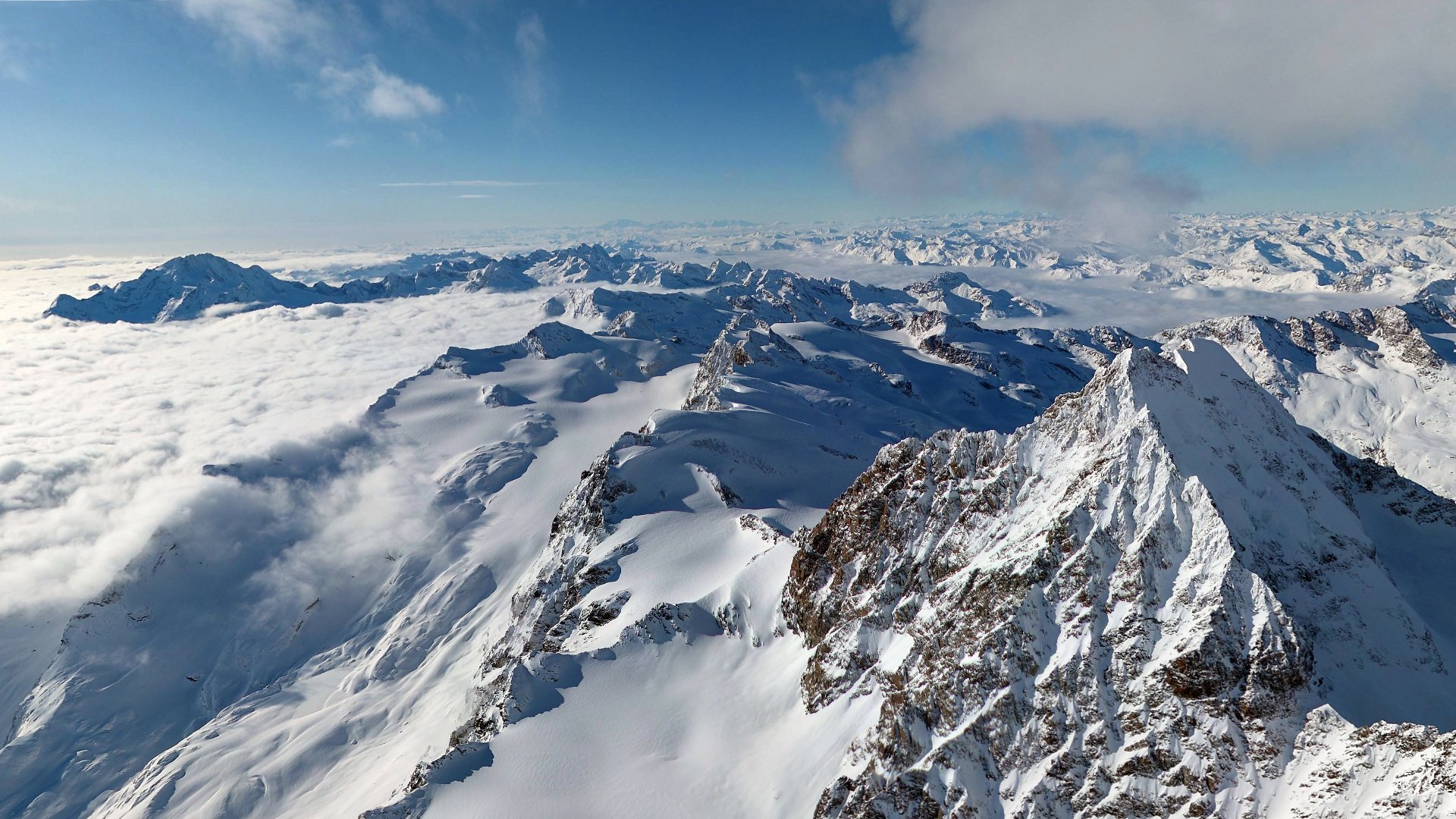 montagne alpi cime neve cielo nuvole