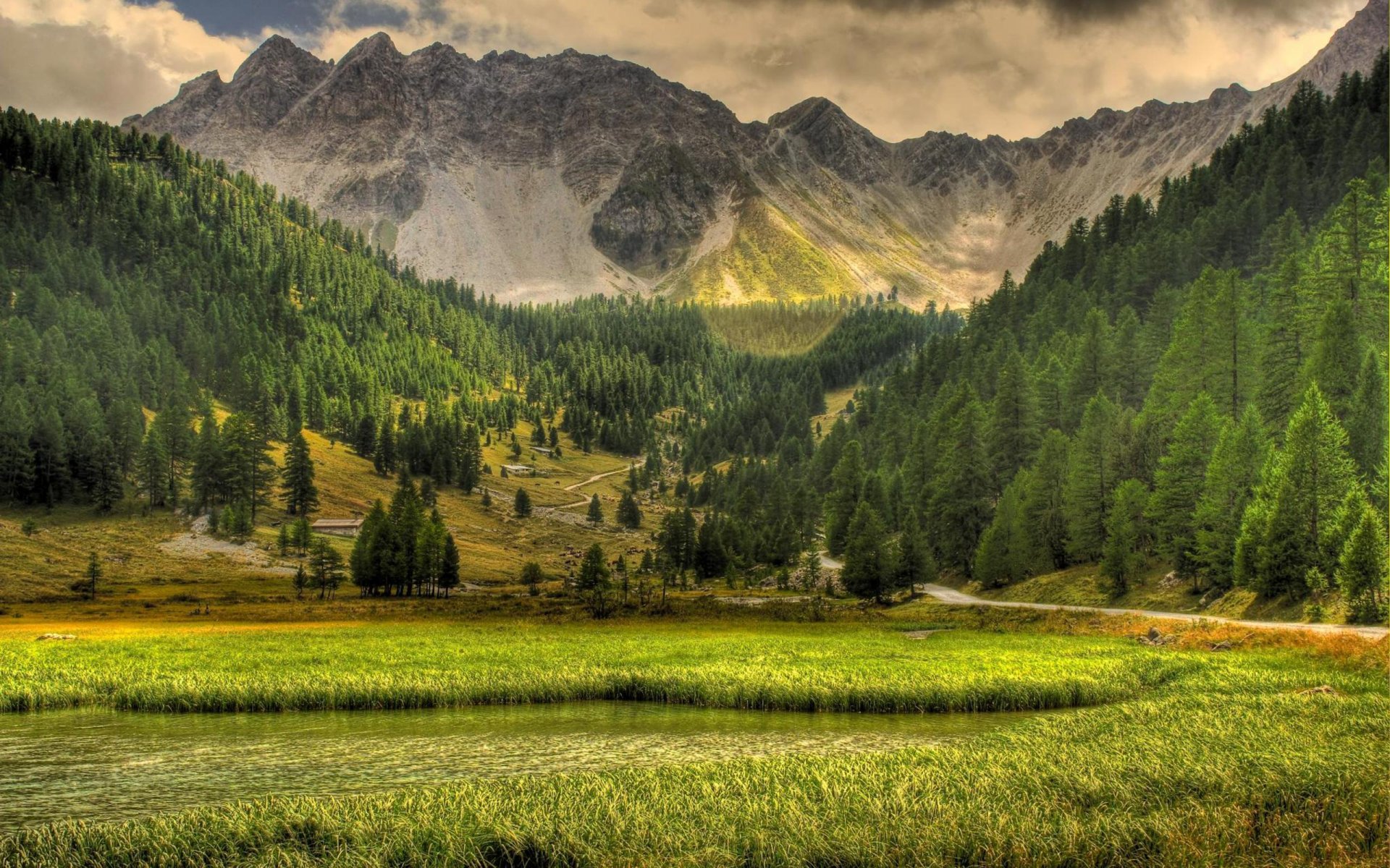 nature landscape mountain tree lake grass sky clouds road