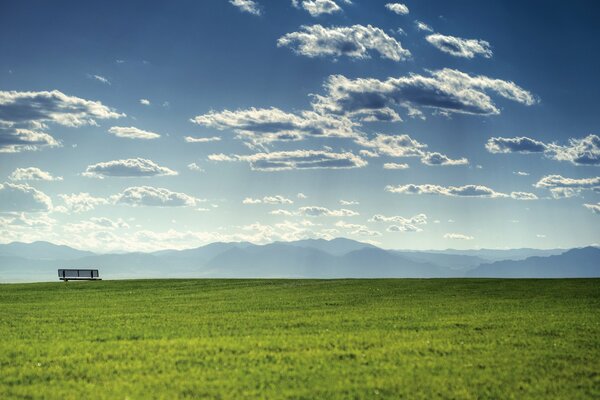 Desktop wallpaper with clouds and horizon